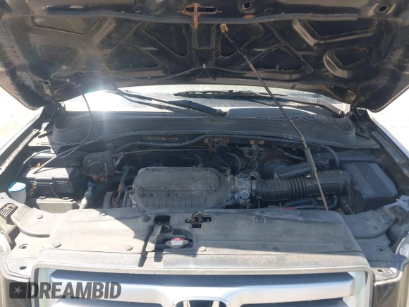 2006 Honda Pilot EX-L with VIN 2HKYF18746H527298, listed as a IAAI auction lot 41941429 with 153,482 mi miles and . Bid and sale history available at DreamBid. Image 10.