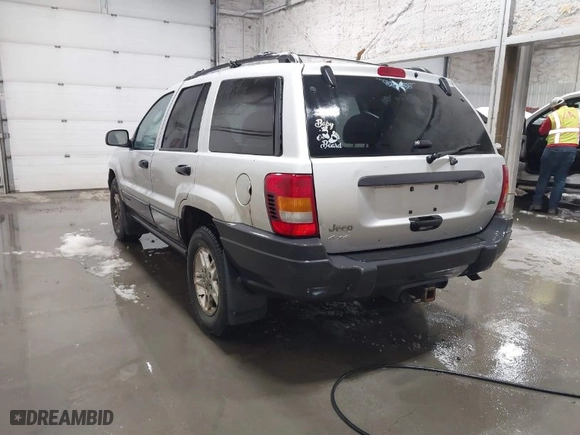 2004 Jeep Grand Cherokee Laredo with VIN 1J4GW48S94C125054, listed as a IAAI auction lot 41788785 with 322,651 mi miles. Bid and sale history available at carsss.com. Image 3.