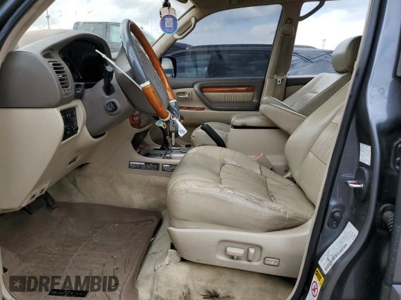 2003 Lexus LX 470 z VIN JTJHT00W733523370, wystawiony jako Copart lot #55516375 z przebiegiem 157 862 mil mil oraz Czysty tytuł • Clean title. Historia ofert i sprzedaży dostępna na DreamBid. Obrazek 7.
