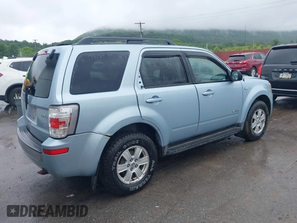 2008 Mercury Mariner with VIN 4M2CU91178KJ12057, listed as a IAAI auction lot 42358190 with 100,000 mi miles and . Bid and sale history available at DreamBid. Image 4.
