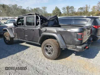 2023 Jeep Gladiator Rubicon с VIN 1C6JJTBGXPL574702, выставлен на аукционе Copart как лот 75914474 с пробегом 10 506 миль миль и Списание • Salvage title. История ставок и продаж доступна на DreamBid. Изображение 2.