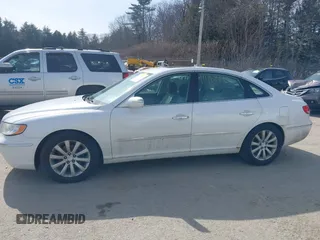 2009 Hyundai Azera Limited z VIN KMHFC46F99A368183, wystawiony jako IAAI lot #41769940 z przebiegiem 144 339 mil mil oraz . Historia ofert i sprzedaży dostępna na DreamBid. Obrazek 12.