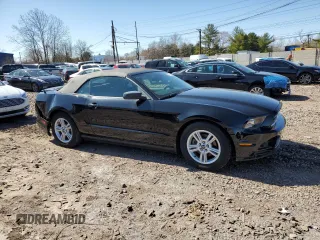 2014 Ford Mustang V6 with VIN 1ZVBP8EM6E5261560, listed as a Copart auction lot 50391185 with 60,700 mi miles and Salvage Title. Bid and sale history available at carsss.com. Image 4.