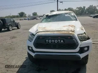 2017 Toyota Tacoma SR5 with VIN 3TMCZ5AN7HM065026, listed as a Copart auction lot 60438365 with 122,329 mi miles and Salvage title. Bid and sale history available at DreamBid. Image 13.
