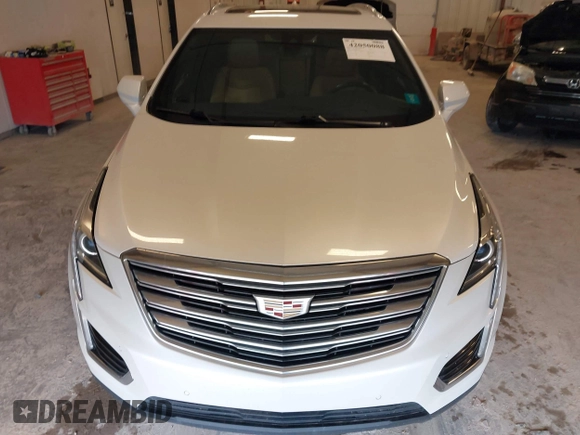 2019 Cadillac XT5 Luxury AWD z VIN 1GYKNDRS3KZ149162, wystawiony jako IAAI lot #42050088 z przebiegiem 109 364 mil mil oraz . Historia ofert i sprzedaży dostępna na DreamBid. Obrazek 12.