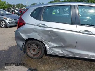 2017 Honda Fit LX z VIN 3HGGK5H50HM705123, wystawiony jako IAAI lot #42427270 z przebiegiem 328 978 mil mil oraz . Historia ofert i sprzedaży dostępna na DreamBid. Obrazek 6.