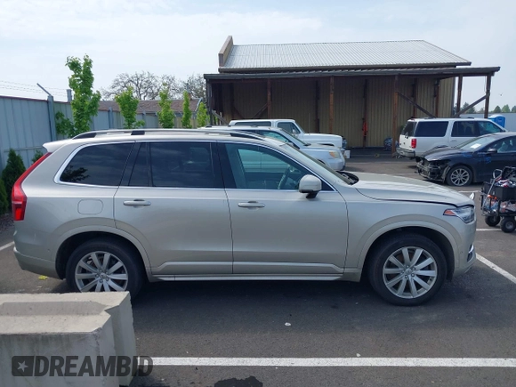 2016 Volvo XC90 T6 Momentum with VIN YV4A22PK7G1038750, listed as a IAAI auction lot 42128057 with 124,112 mi miles. Bid and sale history available at carsss.com. Image 13.