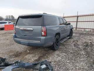 2015 GMC Yukon XL Denali with VIN 1GKS2JKJ3FR616122, listed as a IAAI auction lot 41415642 with Not Provided miles and . Bid and sale history available at DreamBid. Image 4.