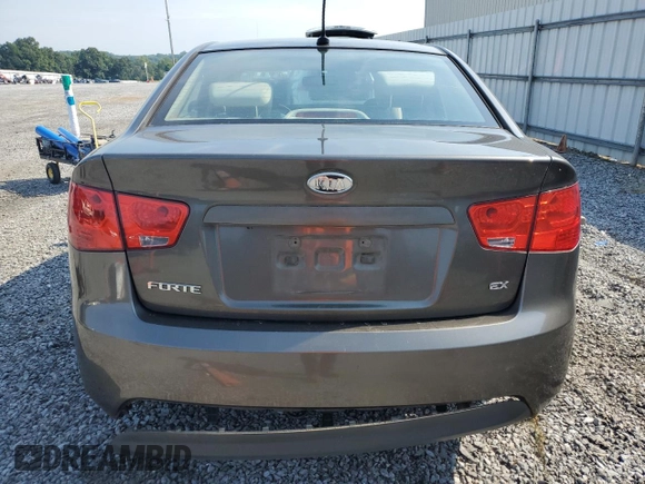 2010 Kia Forte EX with VIN KNAFU4A27A5860680, listed as a Copart auction lot 67848114 with 184,779 mi miles and Salvage Title. Bid and sale history available at carsss.com. Image 6.