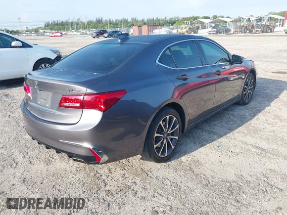 2019 Acura TLX with VIN 19UUB2F39KA004586, listed as a IAAI auction lot 41971144 with 61,081 mi miles and . Bid and sale history available at DreamBid. Image 4.