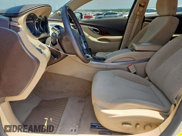 2013 Buick LaCrosse z VIN 1G4GA5E31DF322706, wystawiony jako Copart lot #61290365 z przebiegiem 26 304 mil mil oraz Szkoda całkowita • Salvage title. Historia ofert i sprzedaży dostępna na DreamBid. Obrazek 7.