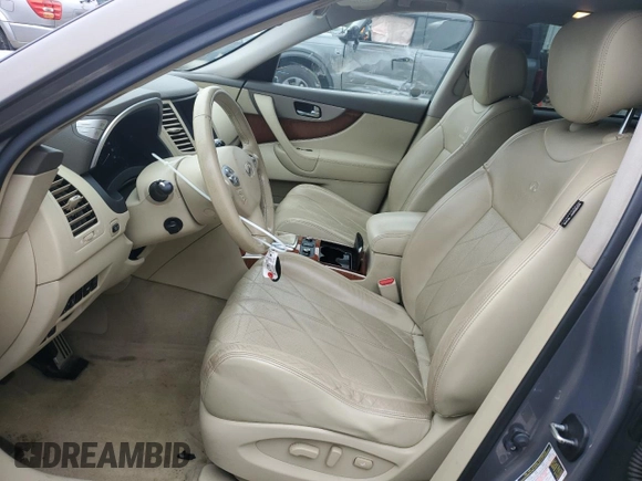 2014 Infiniti QX70 with VIN JN8CS1MW7EM412867, listed as a Copart auction lot 60054195 with 148,064 mi miles and Salvage title. Bid and sale history available at DreamBid. Image 7.