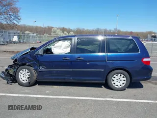 2007 Honda Odyssey LX with VIN 5FNRL38277B098798, listed as a IAAI auction lot 41998802 with 205,657 mi miles and . Bid and sale history available at carsss.com. Image 14.