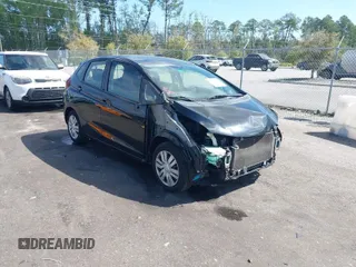 2016 Honda Fit LX with VIN JHMGK5H57GS010902, listed as a IAAI auction lot 41902395 with 124,531 mi miles. Bid and sale history available at carsss.com. Image 1.