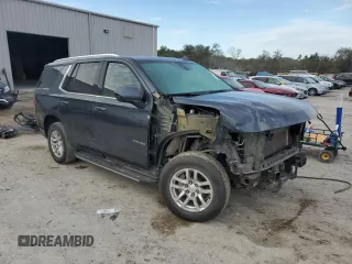 2021 Chevrolet Tahoe LT with VIN 1GNSCNKD5MR252123, listed as a Copart auction lot 42582425 with 114,130 mi miles and Salvage title. Bid and sale history available at DreamBid. Image 4.
