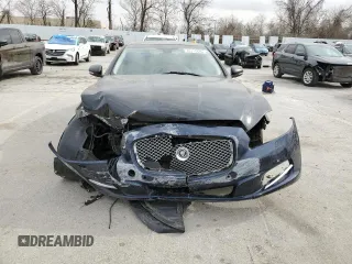 2013 Jaguar XJ z VIN SAJWJ1CD5D8V53294, wystawiony jako Copart lot #49711445 z przebiegiem 100 675 mil mil oraz Szkoda całkowita • Salvage title. Historia ofert i sprzedaży dostępna na DreamBid. Obrazek 5.