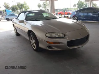 2001 Chevrolet Camaro z VIN 2G1FP32KX12142256, wystawiony jako IAAI lot #42401352 z przebiegiem 120 206 mil mil oraz . Historia ofert i sprzedaży dostępna na DreamBid. Obrazek 1.