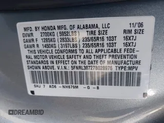 2007 Honda Odyssey EX-L with VIN 5FNRL38727B028976, listed as a IAAI auction lot 42138341 with 169,936 mi miles. Bid and sale history available at carsss.com. Image 9.
