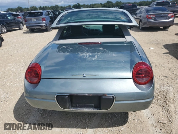 2004 Ford Thunderbird Pacific Coast Roadster with VIN 1FAHP63A04Y108766, listed as a Copart auction lot 74766964 with 30,107 mi miles and Salvage Title. Bid and sale history available at DreamBid. Image 6.