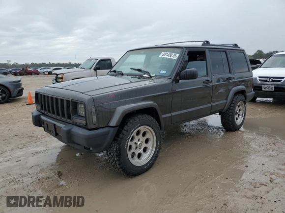 1999 Jeep Cherokee Sport with VIN 1J4FT68S2XL656679, listed as a Copart auction lot 88145875 with 254,038 mi miles and Salvage title. Bid and sale history available at DreamBid. Image 1.