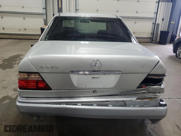 1995 Mercedes-Benz E 320 with VIN WDBEA32E2SC168493, listed as a Copart auction lot 82365704 with 102,066 mi miles and Salvage Title. Bid and sale history available at DreamBid. Image 6.