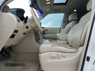 2012 Infiniti QX56 7-passenger with VIN JN8AZ2NF3C9517655, listed as a Copart auction lot 78241174 with 182,533 mi miles and Salvage Title. Bid and sale history available at carsss.com. Image 7.