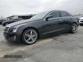 2013 Cadillac ATS Premium z VIN 1G6AE5SX4D0137352, wystawiony jako Copart lot #60391875 z przebiegiem 112 643 mil mil oraz Czysty tytuł • Clean title. Historia ofert i sprzedaży dostępna na DreamBid. Obrazek 1.