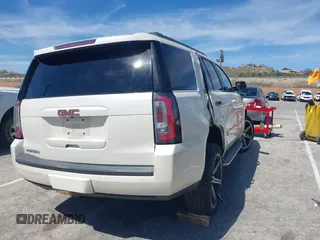 2015 GMC Yukon SLT with VIN 1GKS1BKC3FR102961, listed as a IAAI auction lot 41872717 with 1 mi miles. Bid and sale history available at carsss.com. Image 4.