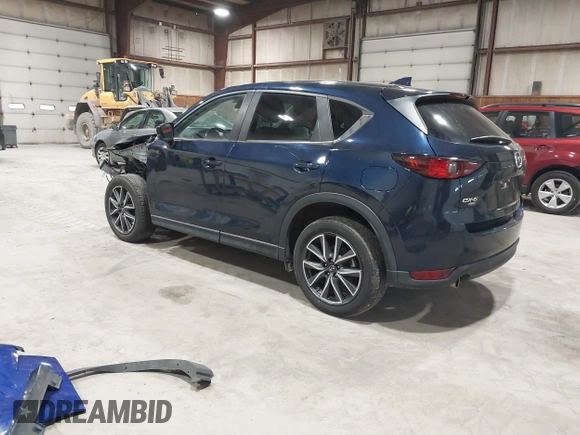2018 Mazda CX-5 Touring with VIN JM3KFBCM5J0434716, listed as a IAAI auction lot 41738956 with 108,264 mi miles and . Bid and sale history available at DreamBid. Image 3.