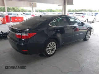 2014 Lexus ES 300h with VIN JTHBW1GG9E2043696, listed as a IAAI auction lot 42392424 with 74,370 mi miles and . Bid and sale history available at DreamBid. Image 4.