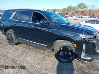 2021 Cadillac Escalade Premium Luxury z VIN 1GYS4BKL5MR195458, wystawiony jako IAAI lot #41020034 z przebiegiem 62 292 mil mil oraz . Historia ofert i sprzedaży dostępna na DreamBid. Obrazek 1.