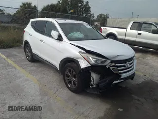 2014 Hyundai Santa Fe with VIN 5XYZTDLB1EG130597, listed as a IAAI auction lot 41907220 with 142,831 mi miles and . Bid and sale history available at DreamBid. Image 1.