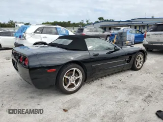 2002 Chevrolet Corvette with VIN 1G1YY32G325123703, listed as a Copart auction lot 77258804 with 26,325 mi miles and Salvage Title. Bid and sale history available at carsss.com. Image 3.