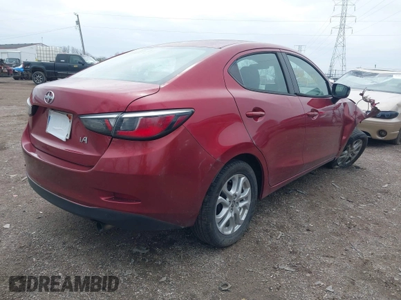 2016 Scion iA with VIN 3MYDLBZV7GY101444, listed as a IAAI auction lot 41962081 with 123,010 mi miles. Bid and sale history available at carsss.com. Image 4.