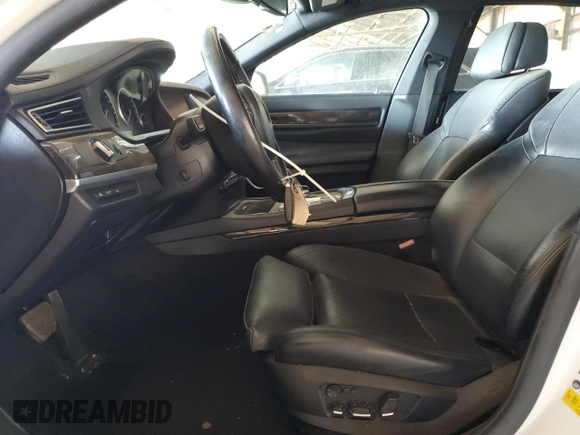 2012 BMW 7 Series 750Li с VIN WBAKB8C59CC852419, выставлен на аукционе Copart как лот 53736305 с пробегом 150 224 миль миль и Списание • Salvage title. История ставок и продаж доступна на DreamBid. Изображение 7.