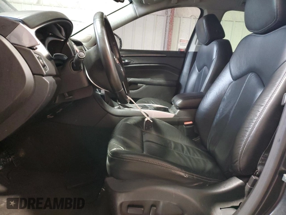2015 Cadillac SRX z VIN 3GYFNAE34FS523702, wystawiony jako Copart lot #44706065 z przebiegiem 148 259 mil mil oraz Szkoda całkowita • Salvage title. Historia ofert i sprzedaży dostępna na DreamBid. Obrazek 7.