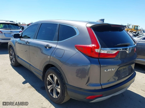 2018 Honda CR-V LX with VIN 2HKRW5H30JH407287, listed as a IAAI auction lot 41866888 with 131,741 mi miles. Bid and sale history available at carsss.com. Image 3.