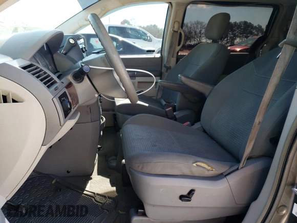 2010 Chrysler Town & Country LX with VIN 2A4RR4DE0AR309771, listed as a Copart auction lot 46296225 with 202,802 mi miles and Salvage Title. Bid and sale history available at DreamBid. Image 7.
