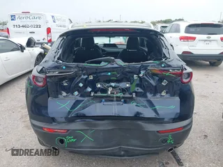 2023 Mazda CX-30 S Carbon Edition with VIN 3MVDMBCM1PM520066, listed as a IAAI auction lot 41877916 with 22,973 mi miles and . Bid and sale history available at carsss.com. Image 17.