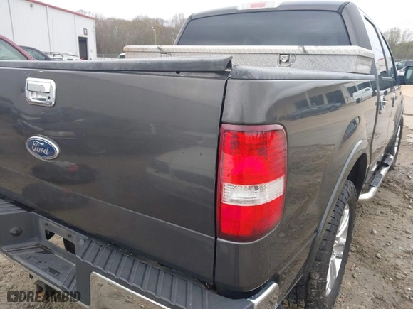 2005 Ford F-150 XLT with VIN 1FTPW12565FA57173, listed as a IAAI auction lot 41872194 with 286,812 mi miles. Bid and sale history available at carsss.com. Image 13.