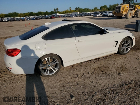 2015 BMW 4 Series 428i with VIN WBA3N3C59FK233053, listed as a Copart auction lot 52651415 with 165,218 mi miles and Salvage Title. Bid and sale history available at DreamBid. Image 3.