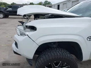2017 Toyota Tacoma SR with VIN 5TFAX5GN7HX093195, listed as a IAAI auction lot 41860071 with 152,925 mi miles. Bid and sale history available at carsss.com. Image 6.