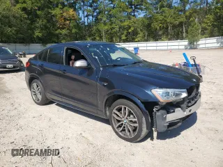 2017 BMW X4 M40i with VIN 5UXXW7C50H0U25192, listed as a Copart auction lot 75571164 with 86,053 mi miles and Salvage Title. Bid and sale history available at carsss.com. Image 4.
