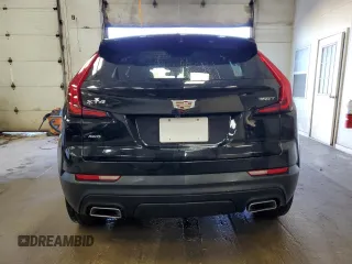 2022 Cadillac XT4 AWD Luxury with VIN 1GYFZBR45NF145986, listed as a Copart auction lot 79198274 with 23,477 mi miles and Salvage Title. Bid and sale history available at carsss.com. Image 6.