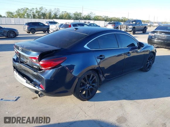 2015 Mazda 6 i Grand Touring with VIN JM1GJ1W58F1201507, listed as a IAAI auction lot 40916832 with 78,322 mi miles and . Bid and sale history available at DreamBid. Image 4.