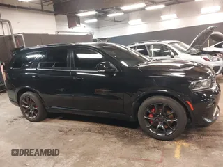2023 Dodge Durango R/T Plus with VIN 1C4SDJCT8PC571642, listed as a IAAI auction lot 42093743 with 33,631 mi miles and . Bid and sale history available at DreamBid. Image 13.