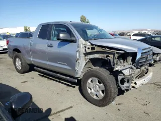 2012 Toyota Tundra 4WD Truck with VIN 5TFUM5F12CX031331, listed as a Copart auction lot 73571524 with 273,611 mi miles and Salvage Title. Bid and sale history available at carsss.com. Image 4.