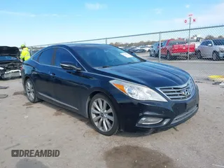 2014 Hyundai Azera Limited with VIN KMHFH4JG7EA353094, listed as a IAAI auction lot 41043222 with 184,924 mi miles and . Bid and sale history available at carsss.com. Image 1.