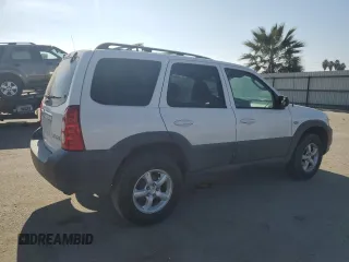 2005 Mazda Tribute i with VIN 4F2YZ02Z95KM24700, listed as a Copart auction lot 42002775 with 128,891 mi miles and Salvage Title. Bid and sale history available at carsss.com. Image 3.