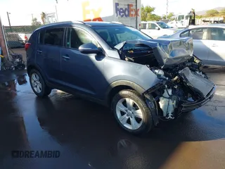 2013 Kia Sportage LX with VIN KNDPB3A28D7457632, listed as a IAAI auction lot 41265443 with 90,786 mi miles and . Bid and sale history available at DreamBid. Image 1.
